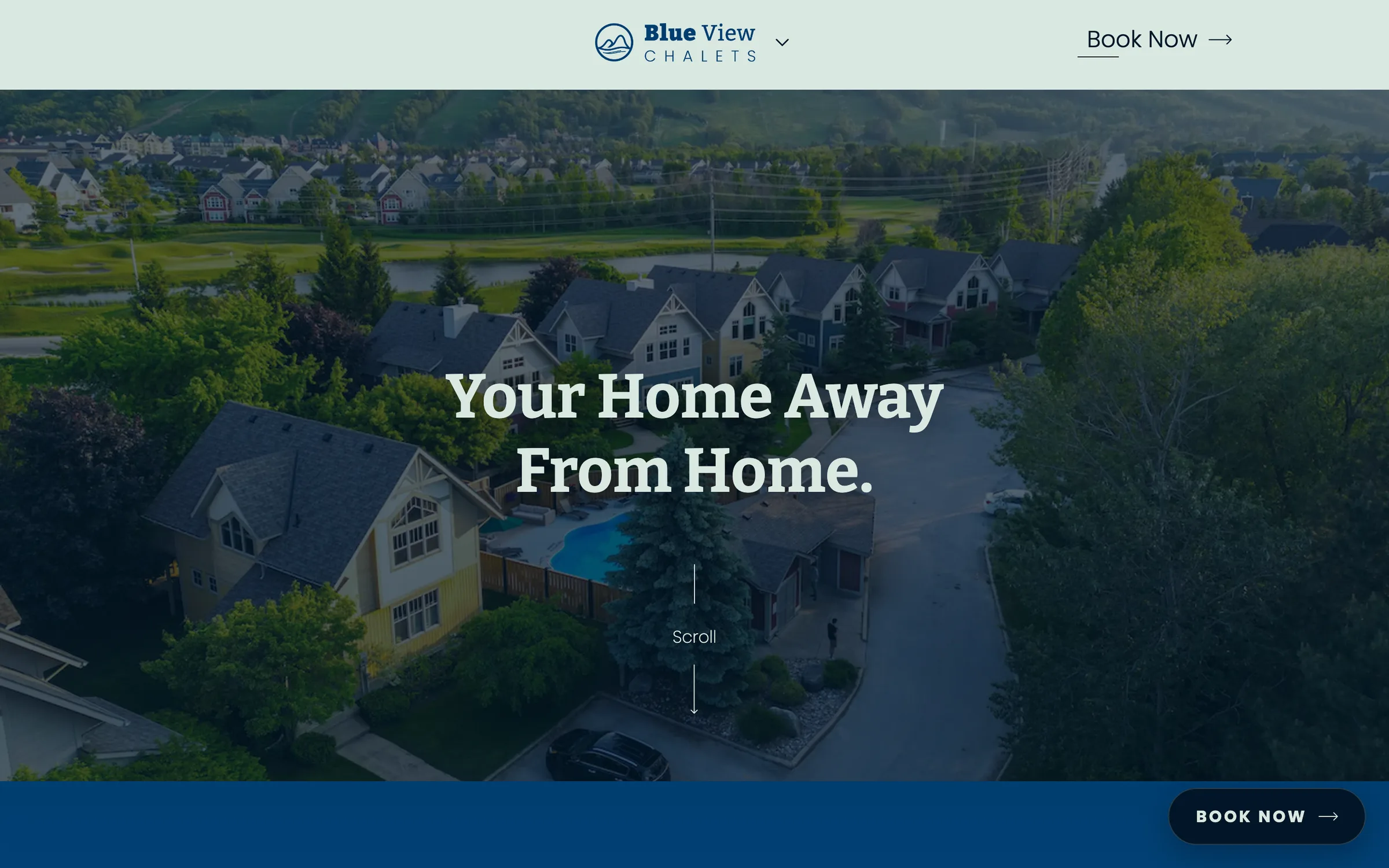 Blue View Chalets homepage showing an aerial photograph of chalets below the headline Your Home Away From Home